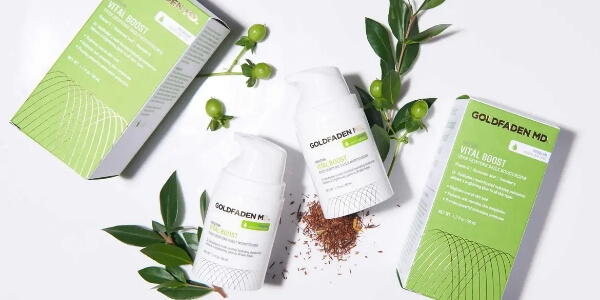 Some skincare products with green packaging.